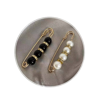 Broche imperdible con perlas y strass de fantasía