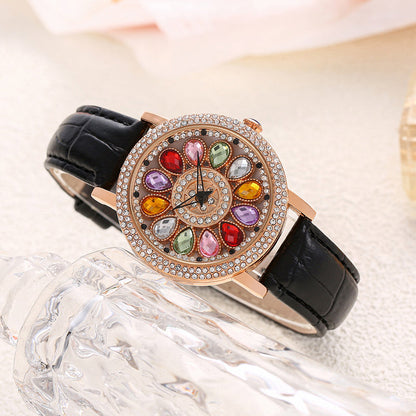 Reloj de Mujer con Esfera Giratoria y Diamantes Simulados de Colores