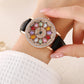 Reloj de Mujer con Esfera Giratoria y Diamantes Simulados de Colores