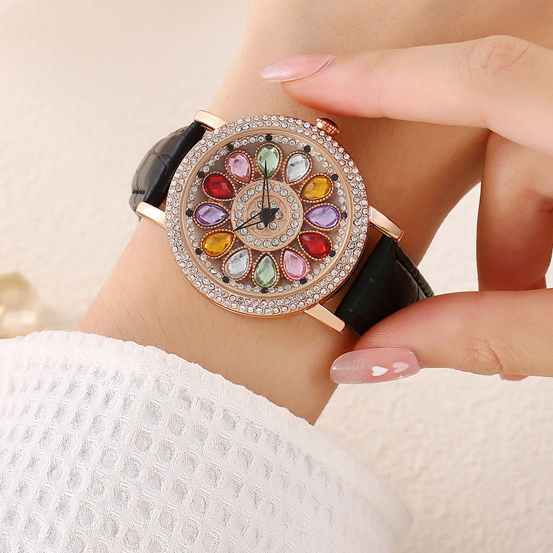 Reloj de Mujer con Esfera Giratoria y Diamantes Simulados de Colores