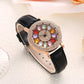 Reloj de Mujer con Esfera Giratoria y Diamantes Simulados de Colores