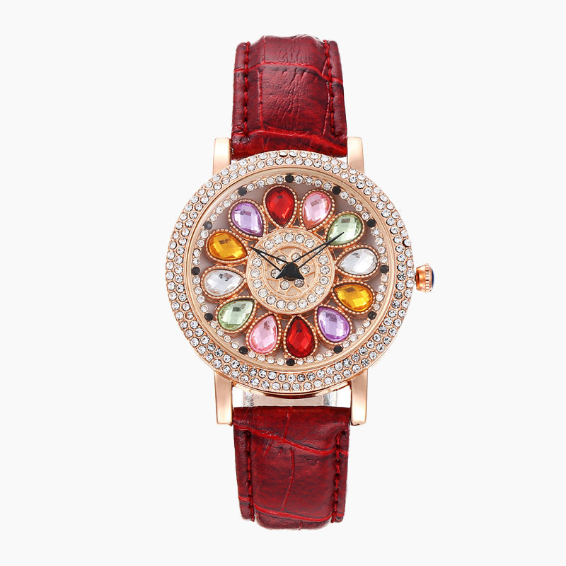 Reloj de Mujer con Esfera Giratoria y Diamantes Simulados de Colores