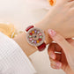 Reloj de Mujer con Esfera Giratoria y Diamantes Simulados de Colores