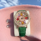 Reloj de Mujer con Esfera Giratoria y Diamantes Simulados de Colores