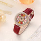 Reloj de Mujer con Esfera Giratoria y Diamantes Simulados de Colores