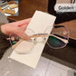 Pousbo® Gafas sin marco anti-luz azul de moda