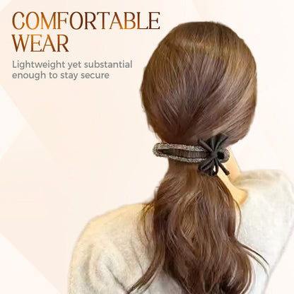 Elegante horquilla con lazo negro brillante para recogidos