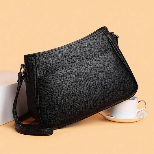 Bolso bandolera de piel sintética suave y elegante
