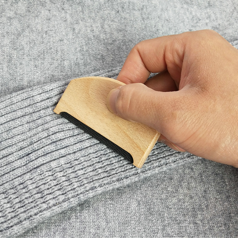 Afeitadora manual de madera para ropa