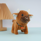Vaca de peluche eléctrica realista con sonido