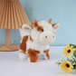 Vaca de peluche eléctrica realista con sonido