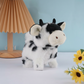 Vaca de peluche eléctrica realista con sonido