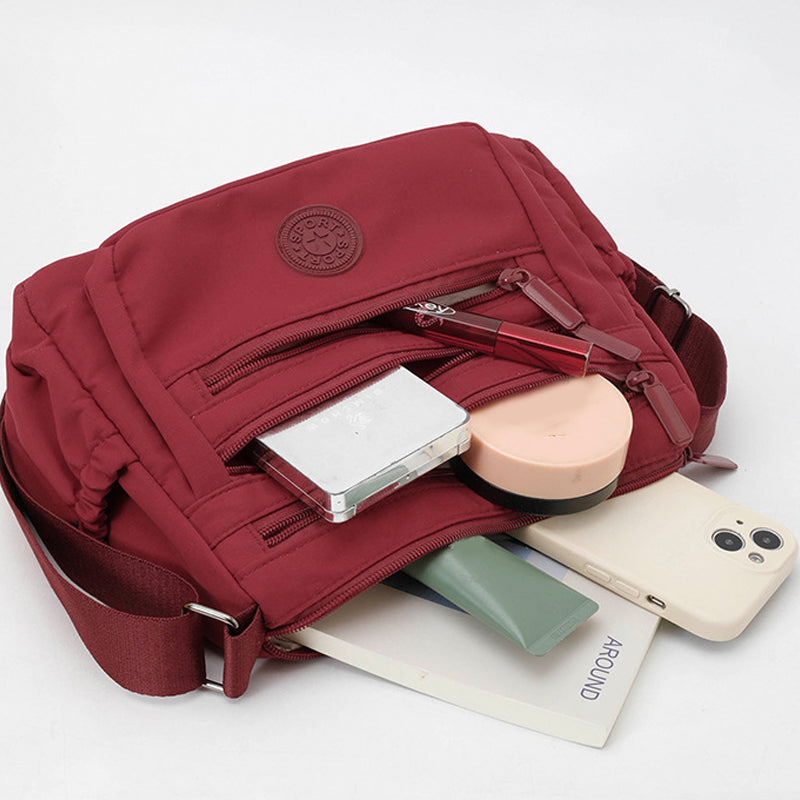 Bolso bandolera ligero de nailon con múltiples bolsillos