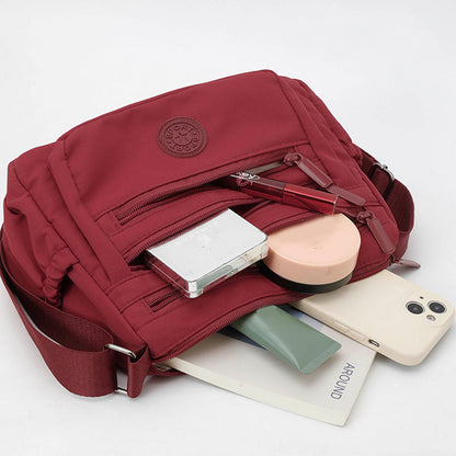 Bolso bandolera ligero de nailon con múltiples bolsillos