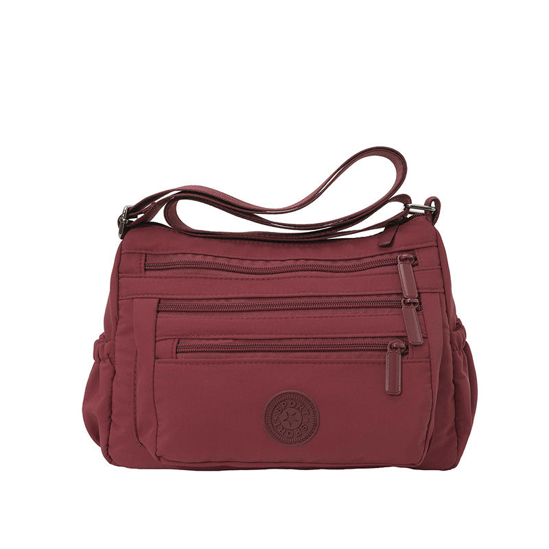 Bolso bandolera ligero de nailon con múltiples bolsillos