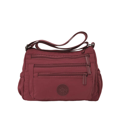 Bolso bandolera ligero de nailon con múltiples bolsillos