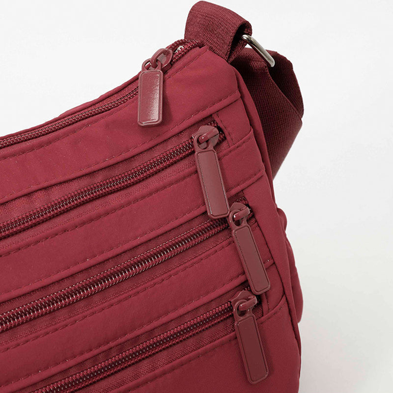 Bolso bandolera ligero de nailon con múltiples bolsillos