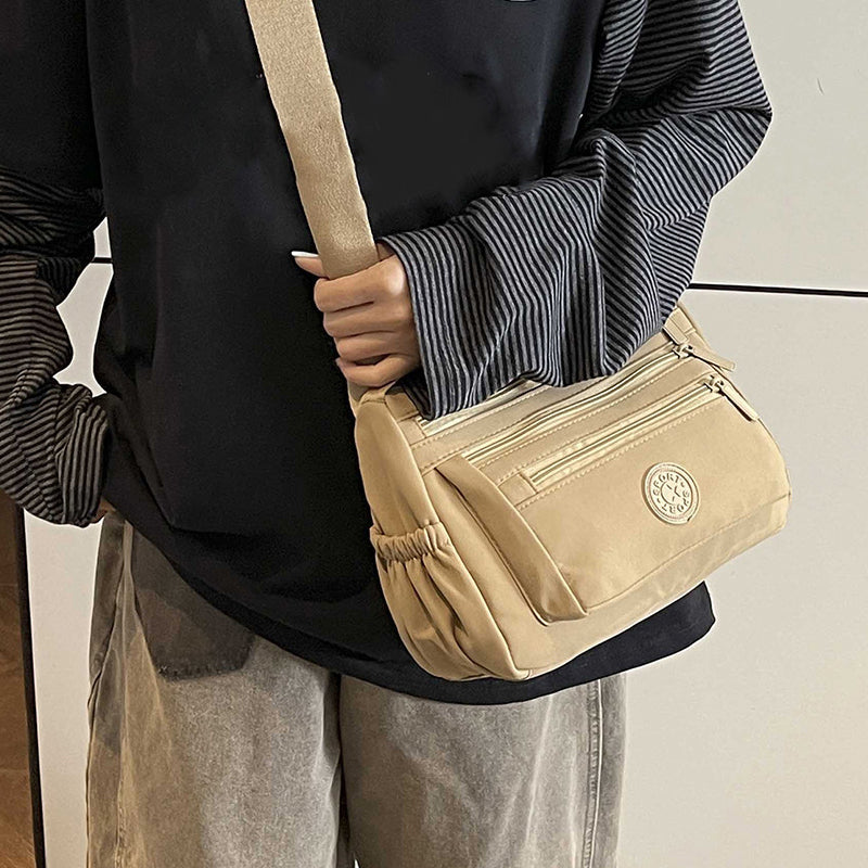Bolso bandolera ligero de nailon con múltiples bolsillos