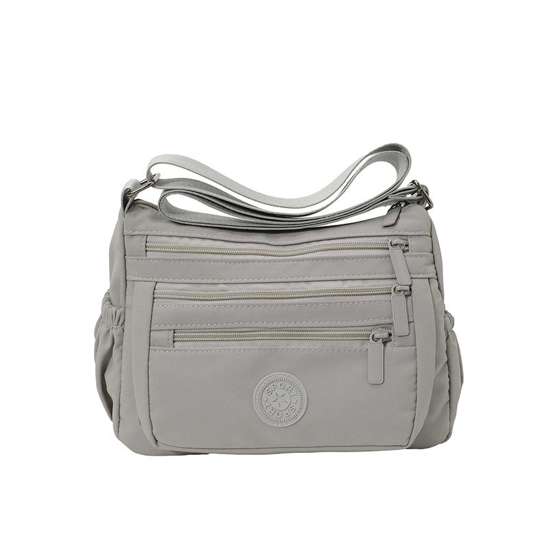 Bolso bandolera ligero de nailon con múltiples bolsillos