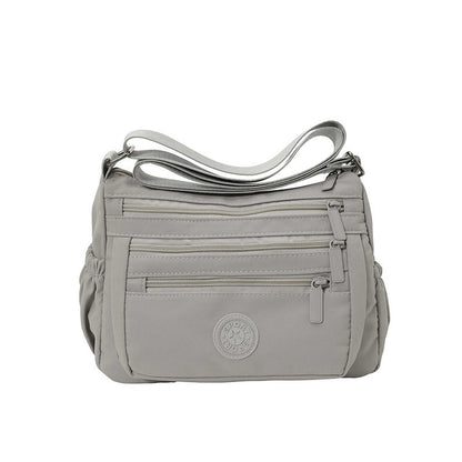 Bolso bandolera ligero de nailon con múltiples bolsillos