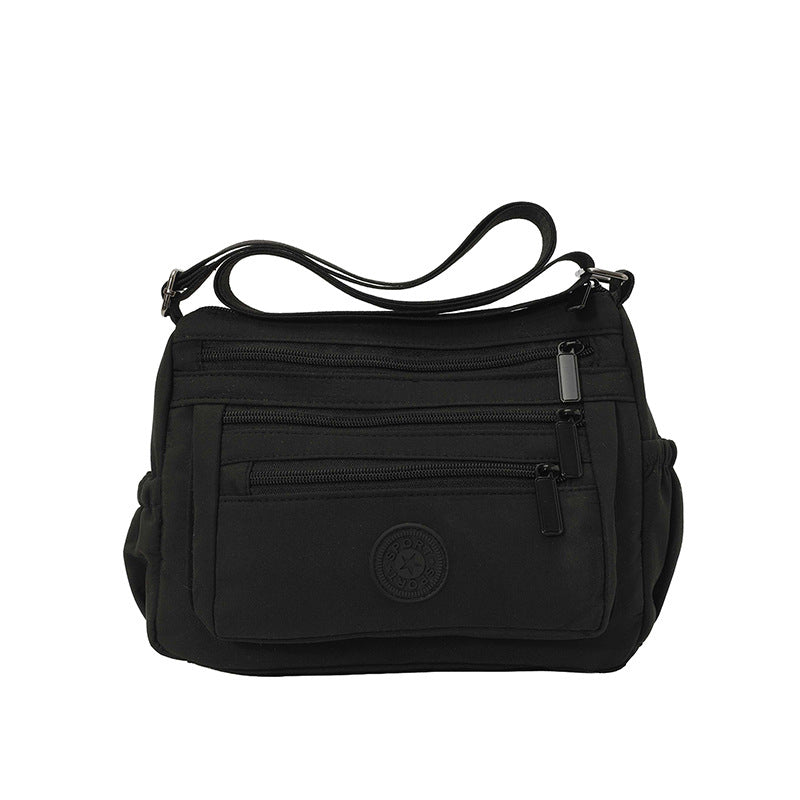 Bolso bandolera ligero de nailon con múltiples bolsillos
