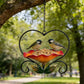 Comedero para pájaros con forma de corazón y motivos florales